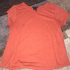 orange slightly cropped t-shirt